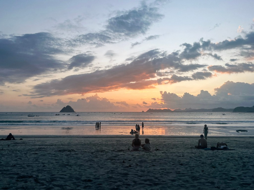 Cloudy sunset over Selong Belanak Beach, Lombok, Indonesia.