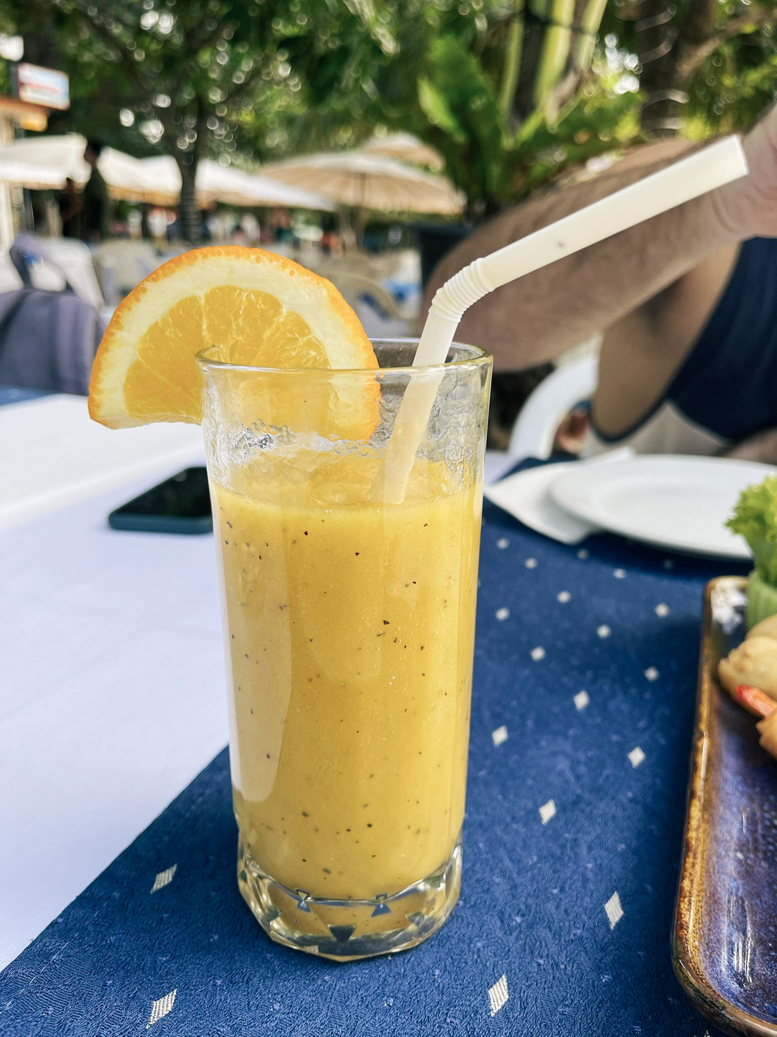 Mango, papaya and orange juice blend at Almond Sea View Chilled Restaurant, Phuket, Thailand.