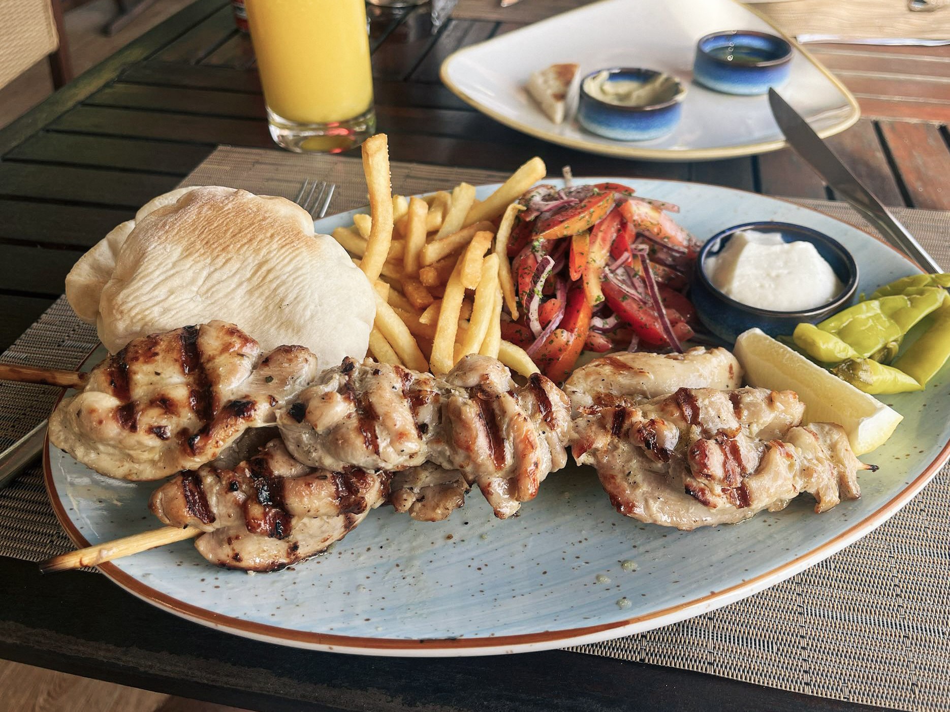 Chicken shish taouk at Rock Salt Restaurant, Nai Harn Beach, Phuket, Thailand.